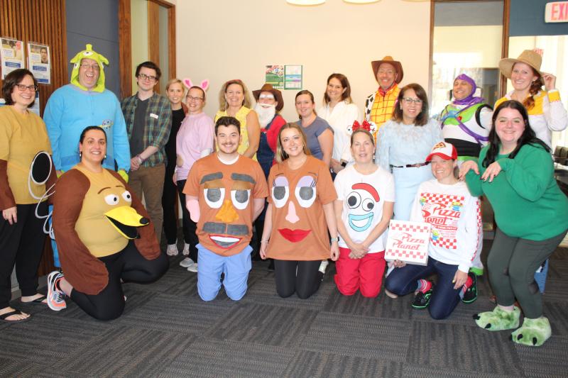 Staff photo of everyone dressed as toy story